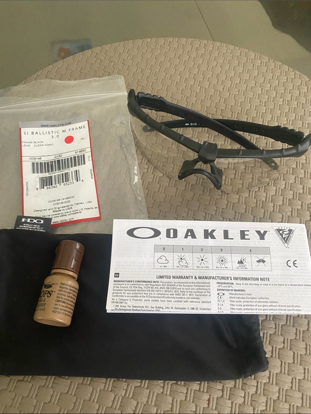 Oakley Men’s Black Impact Resistant Frame Sunglasses with Clear Nosepiece